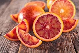 Tête : Orange sanguine, Cassis, Orange